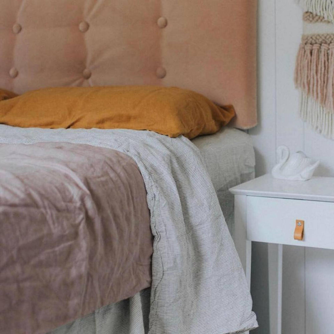 Foxtrot Home French Flax Linen styled in a bedroom with Pinstripe Sheets Sets.