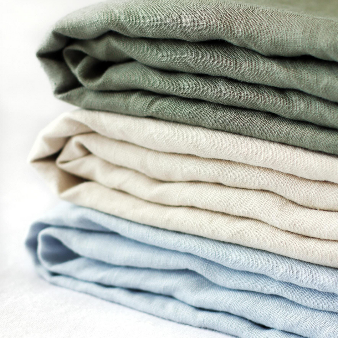 Foxtrot Home French Flax Linen styled in a bedroom with Powder Blue Sheets Set.