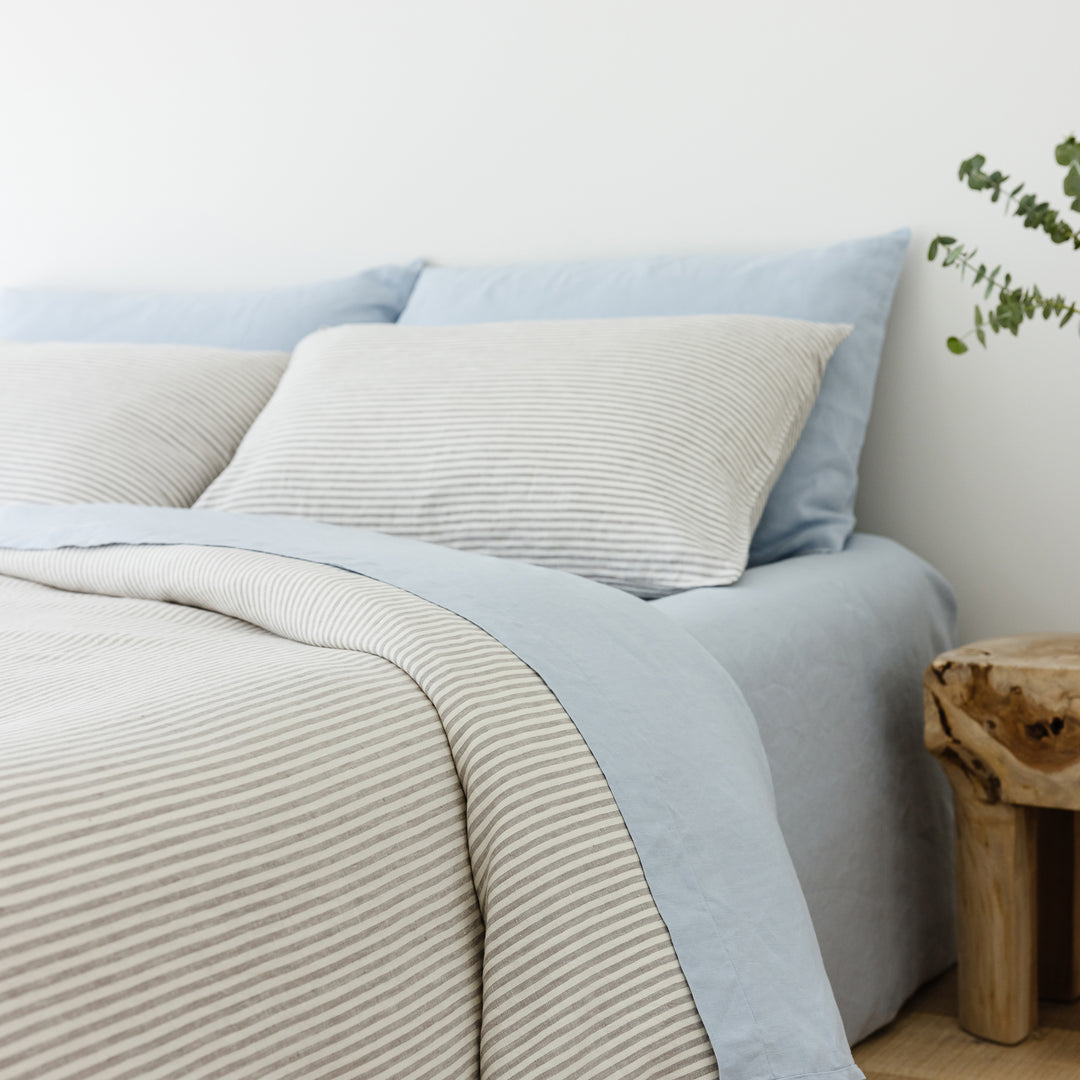 Foxtrot Home French Flax Linen styled in a bedroom with Powder Blue Sheets Set.