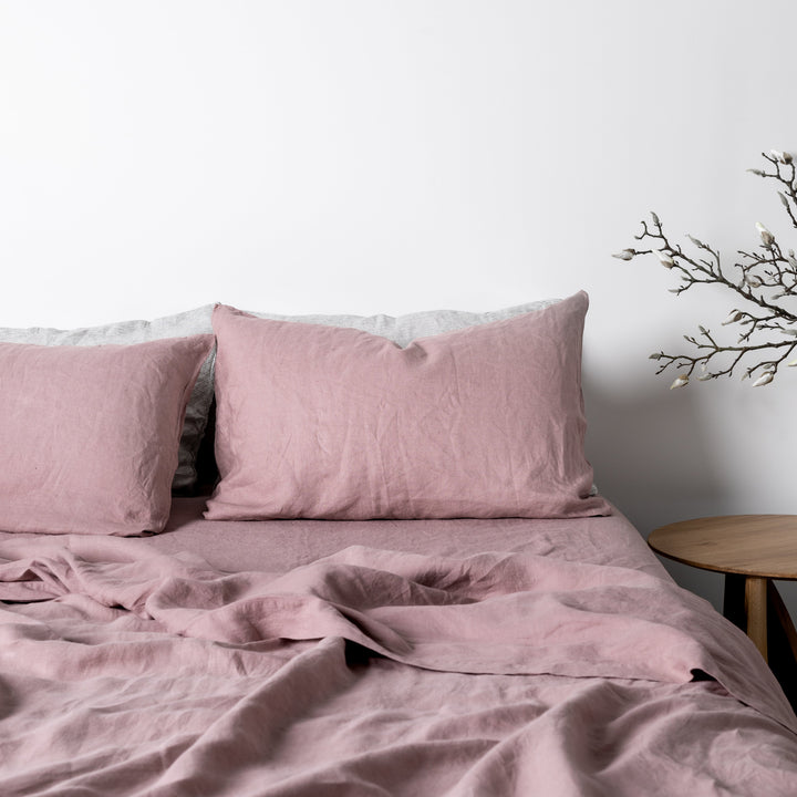 Foxtrot Home French Flax Linen styled in a bedroom with Rosewood Pink Sheets Set.