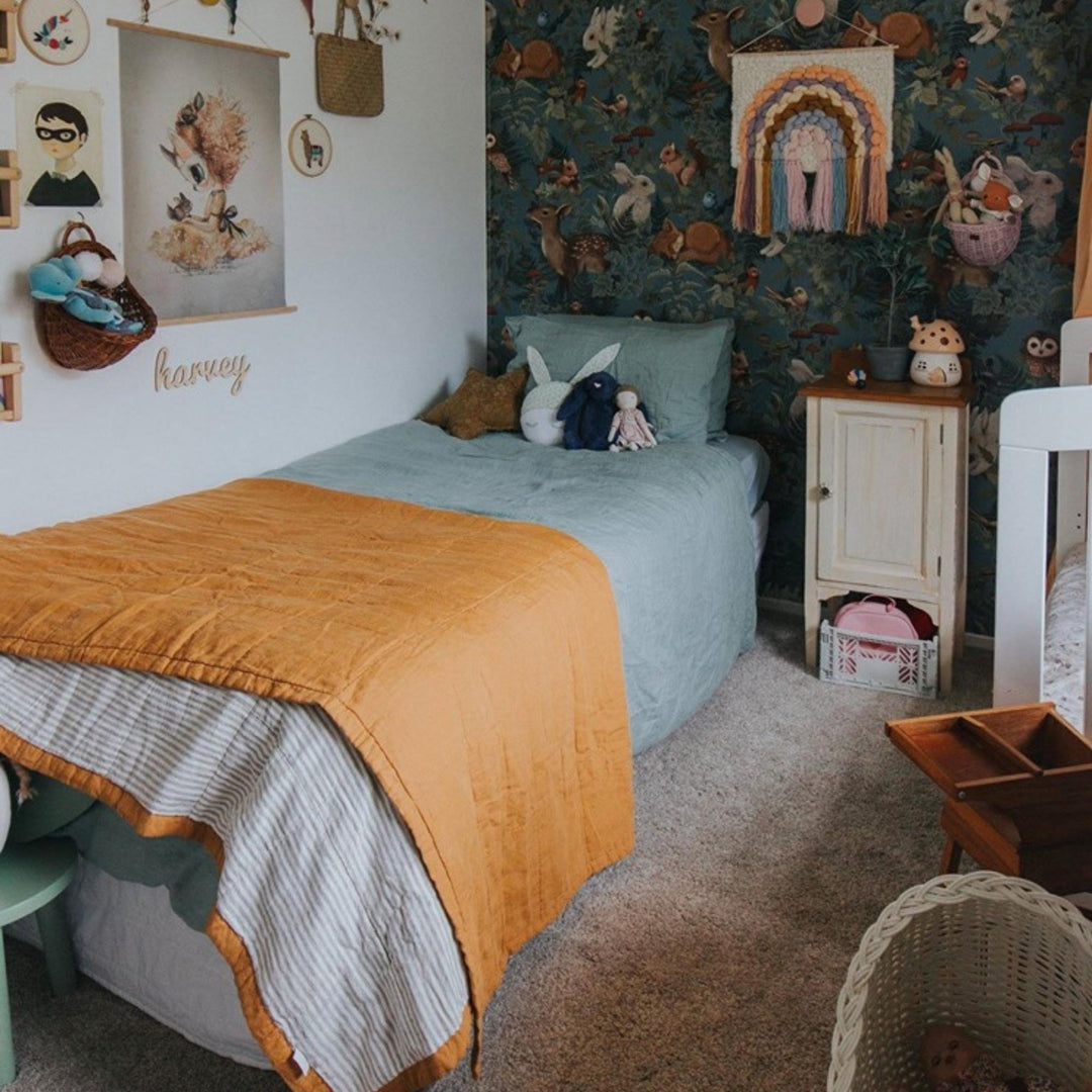 Foxtrot Home French Flax Linen styled in a bedroom with Sage Green Duvet, Grey Stripes Sheets and Pillowcases.