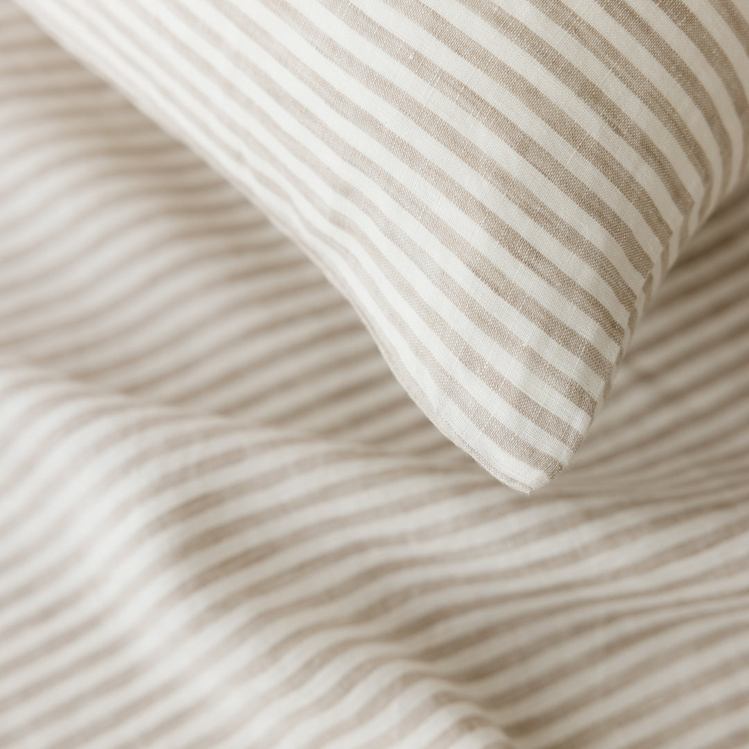 Foxtrot Home French Flax Linen bedroom styled with Sand Stripes Flat Sheet