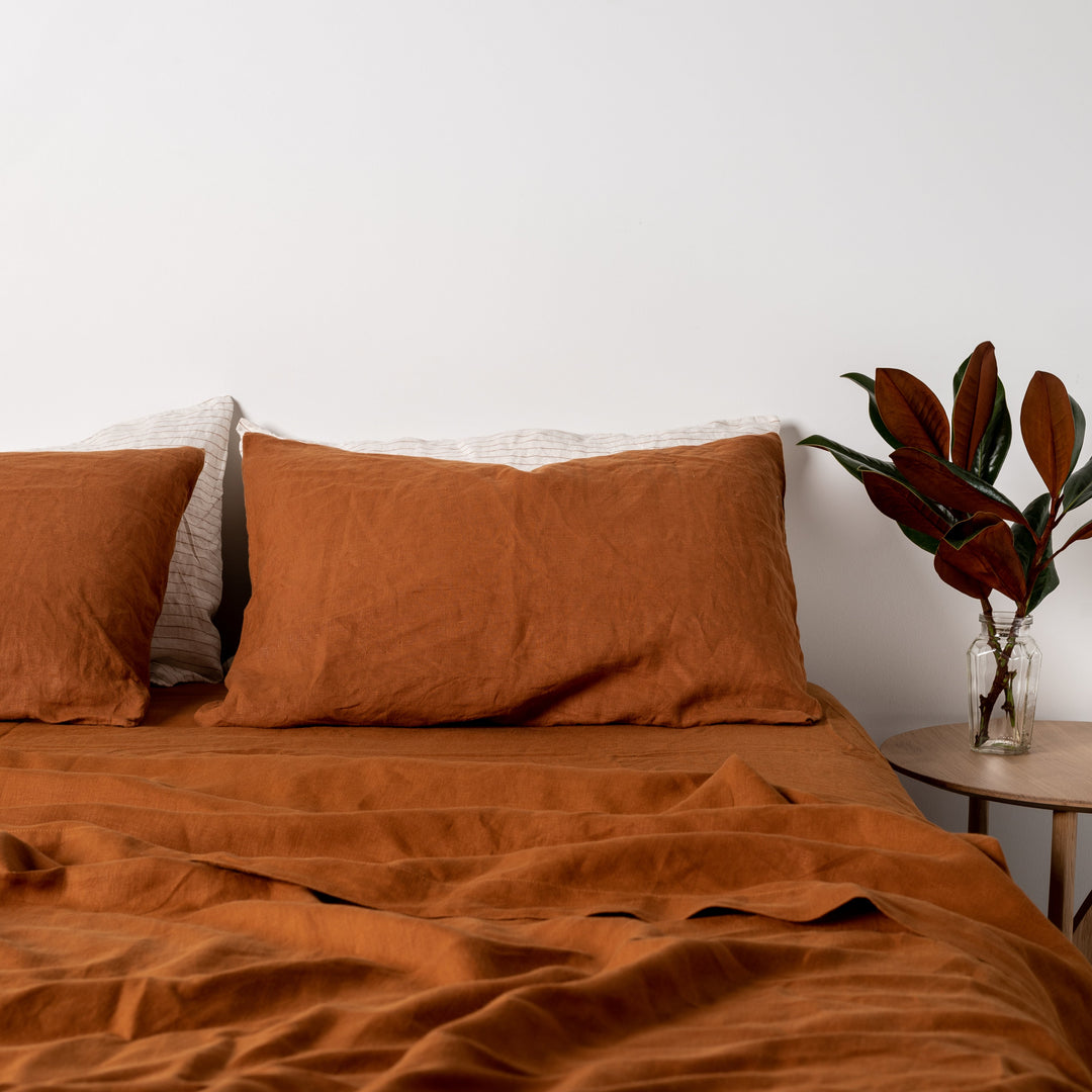 Foxtrot Home French Flax Linen styled in a bedroom with Tobacco Fitted Sheet.
