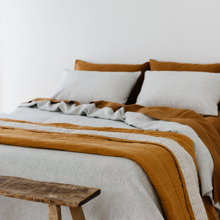 Foxtrot Home French Flax Linen styled in a bedroom with Tobacco Sheets Sets.