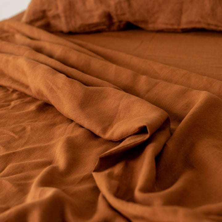 Foxtrot Home French Flax Linen styled in a bedroom with Tobacco Sheets Sets.