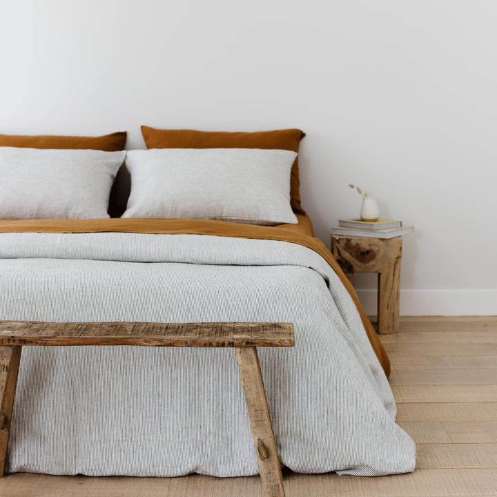 Foxtrot Home French Flax Linen styled in a bedroom with Tobacco Sheets Sets.