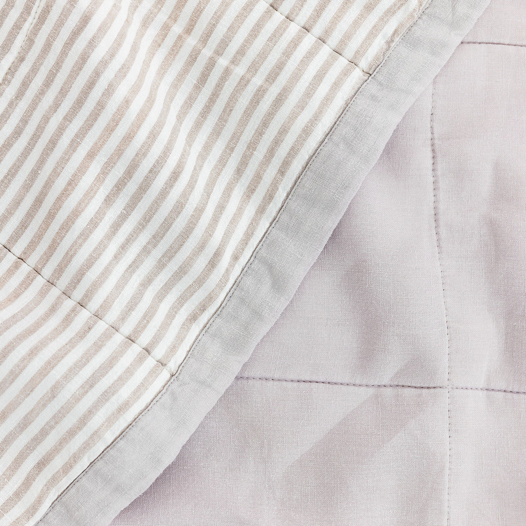 Foxtrot Home French Flax Linen Lilac Quilt with Grey Stripes on the reverse