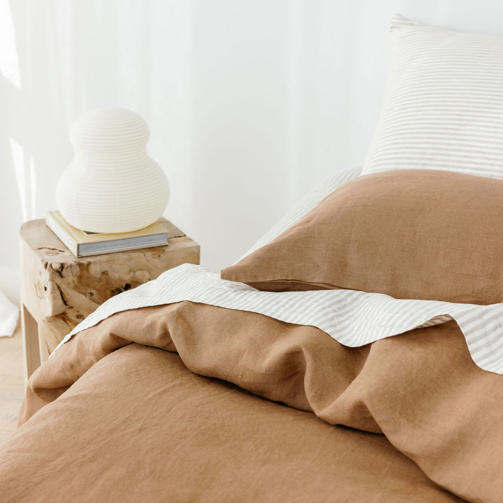 Foxtrot Home French Flax Linen styled with a Malt Brown Duvet