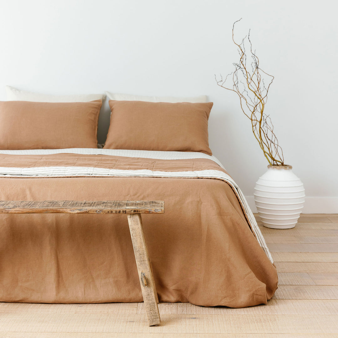 Foxtrot Home French Flax Linen styled with a Malt Brown Duvet