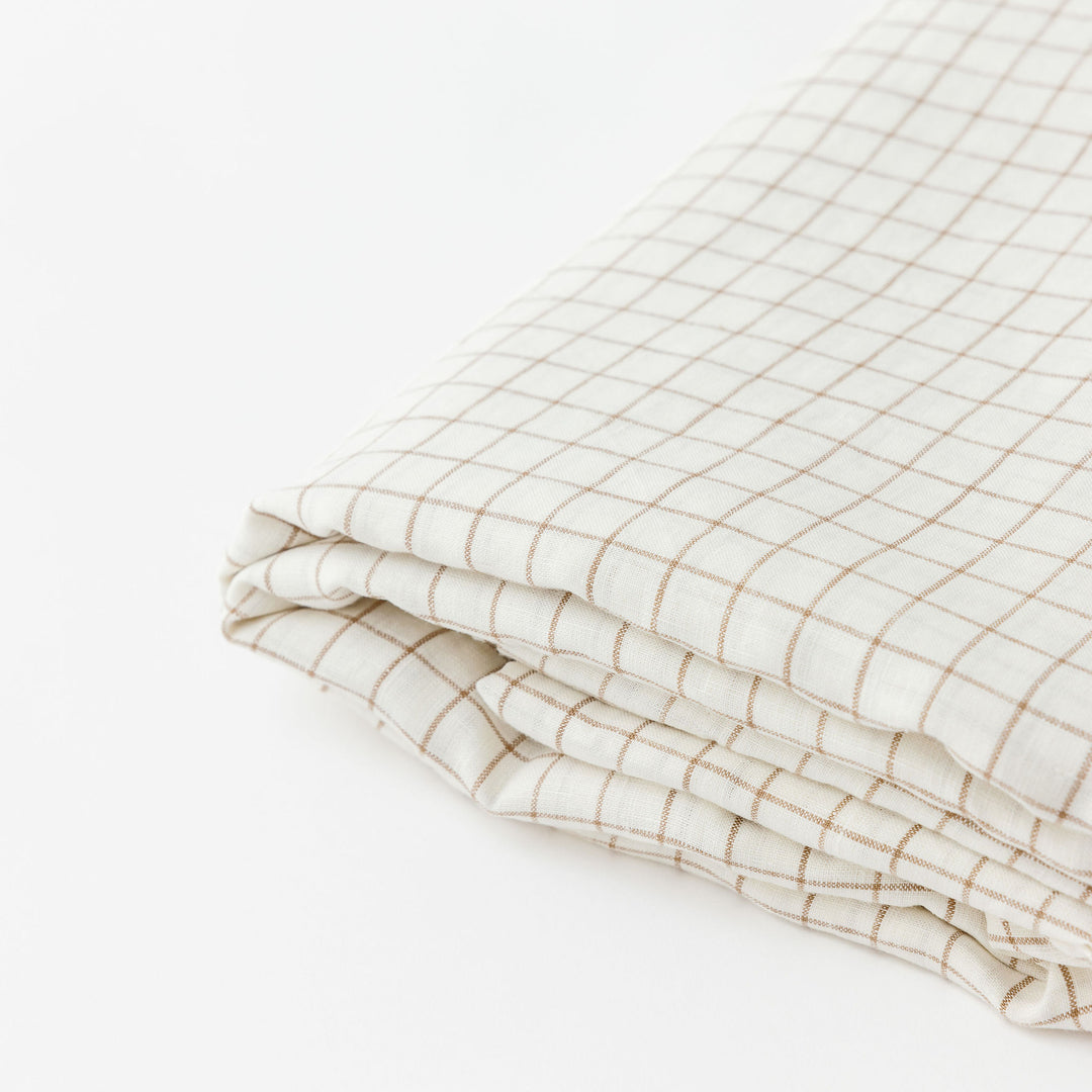 Foxtrot Home French Flax Linen styled with Malt Brown Grid Sheet Sets