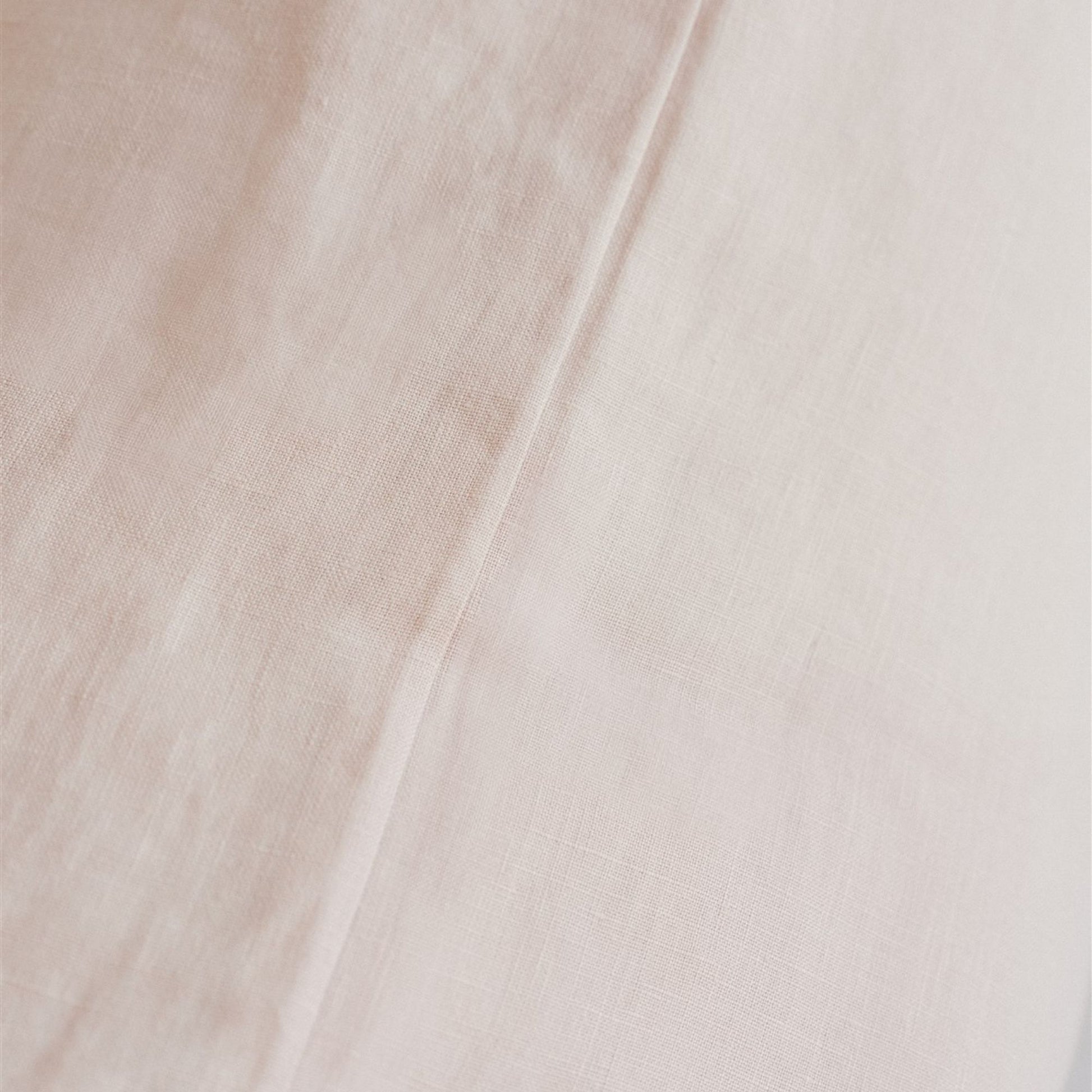 Foxtrot Home French Flax Linen styled in a bedroom with Blush Pink