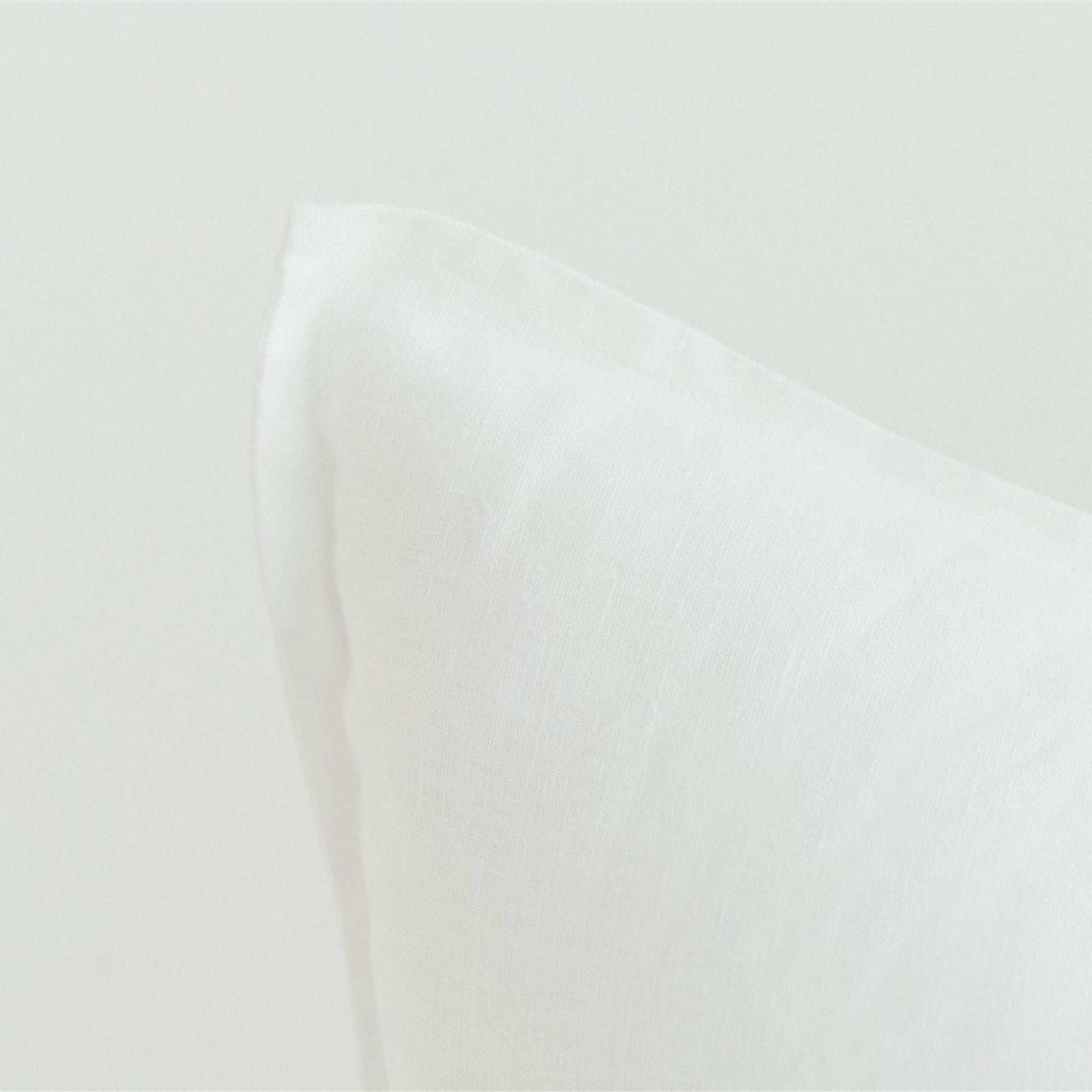 Foxtrot Home French Flax Linen styled with a Brilliant White Cushion