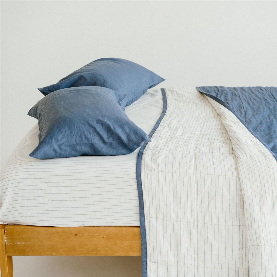 Foxtrot Home French Flax Linen Coastal Blue Quilt with Coastal Blue Stripes on reverse
