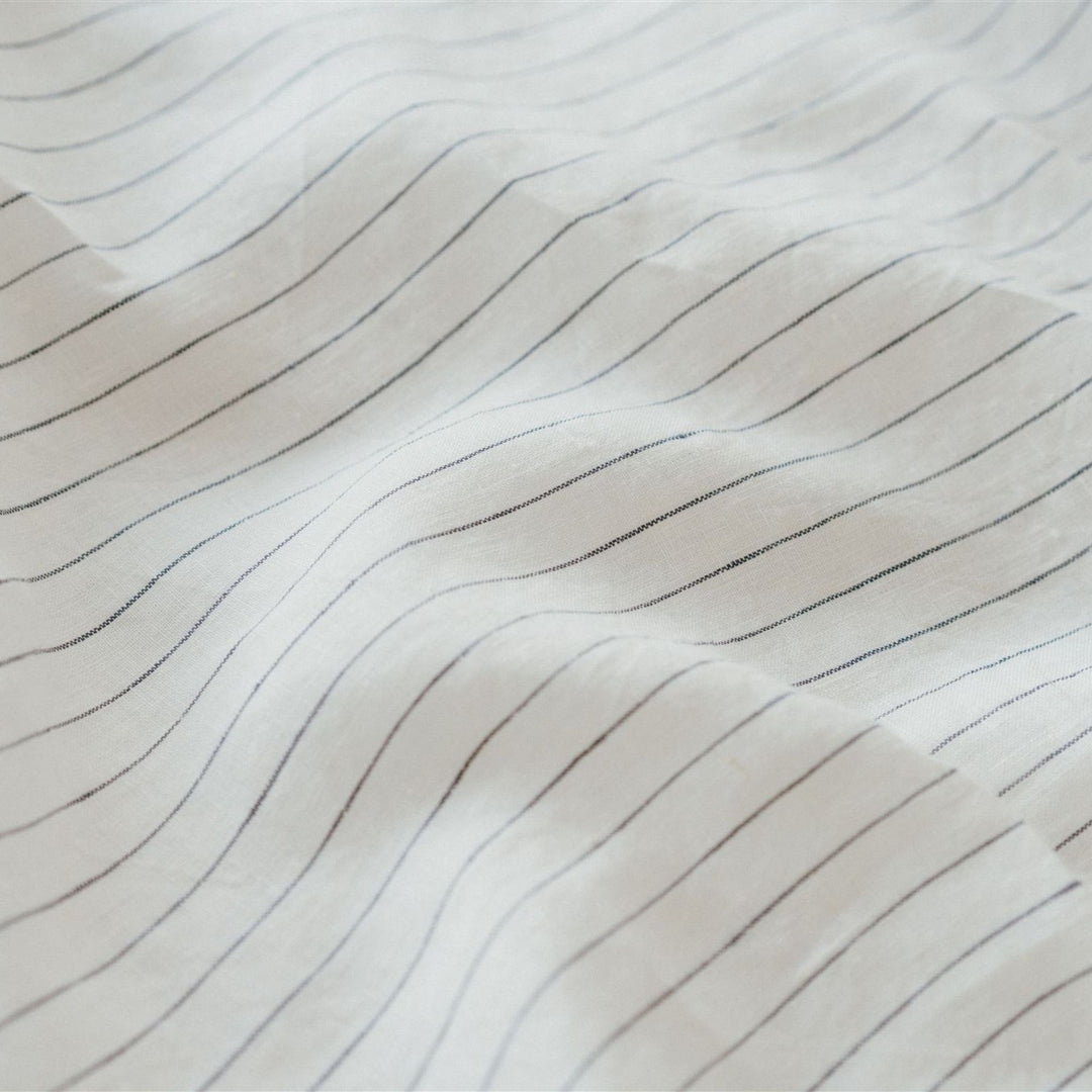 Foxtrot Home French Flax Linen Coastal Blue Quilt with Coastal Blue Stripes on reverse