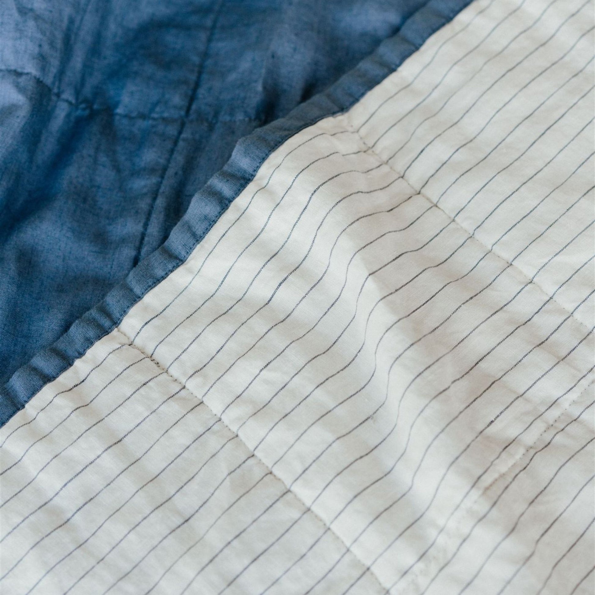 Foxtrot Home French Flax Linen Coastal Blue Quilt with Coastal Blue Stripes on reverse