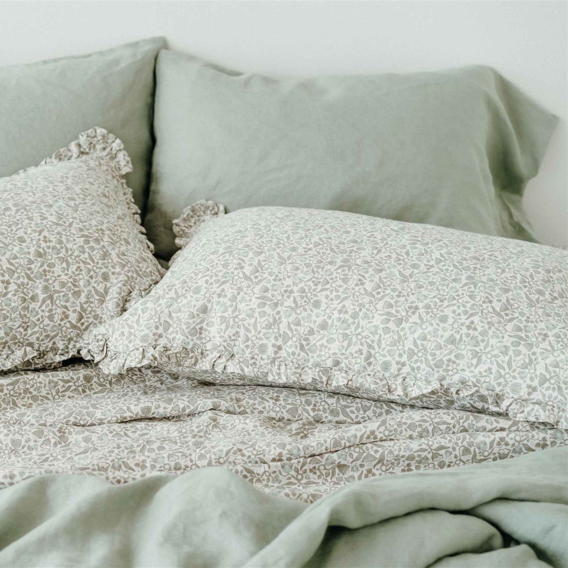 Pure French Flax Fitted Sheet in vintage floral print Evelyn.  A whimsical pattern for Spring.  Discover Foxtrot Home’s natural, ethically produced bedding for relaxed styling.