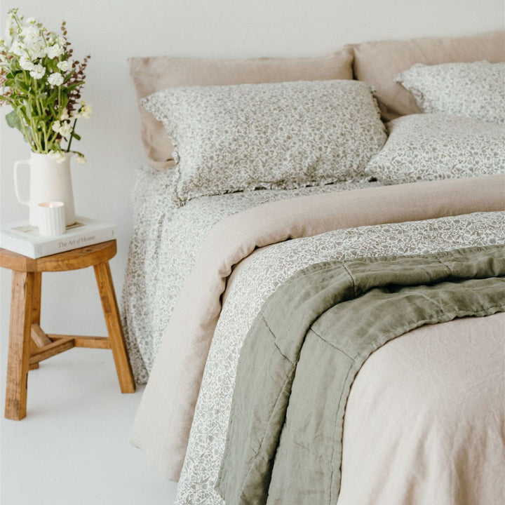 Pure French Flax Quilt in vintage floral print Evelyn.  A whimsical pattern for Spring.  Discover Foxtrot Home’s natural, ethically produced bedding for relaxed styling.