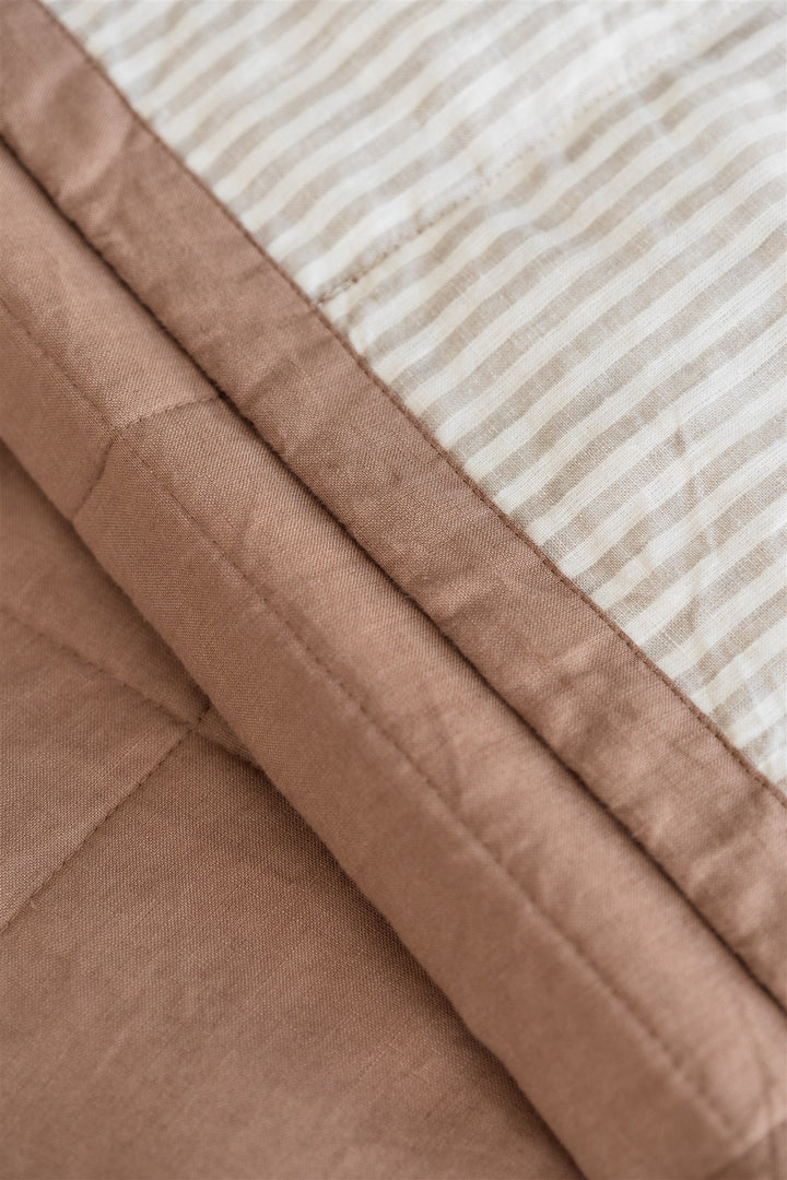 Foxtrot Home French Flax Linen styled in a bedroom with Malt Brown and Sand Stripes Quilt