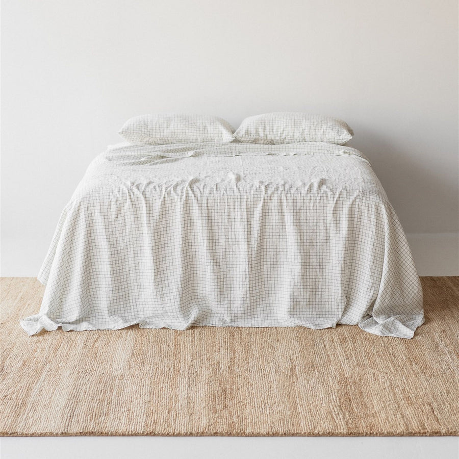 Foxtrot Home French Flax Linen styled in a bedroom with Cactus Grid Sheet Set