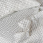 Foxtrot Home French Flax Linen styled in a bedroom with Cactus Grid Sheet Set