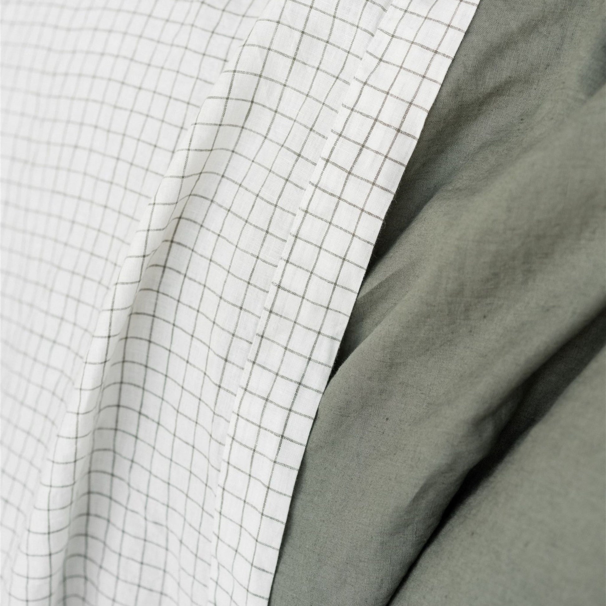 Foxtrot Home French Flax Linen styled in a bedroom with Cactus Grid Fitted Sheet.