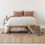 Foxtrot Home French Flax Linen styled with Malt Brown Sheets and an Oat Duvet