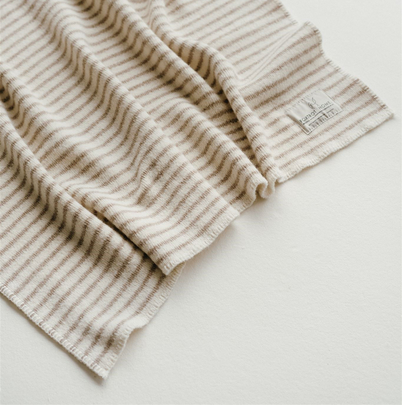 Foxtrot Home New Zealand Wool Throw Blanket in Sand Stripes