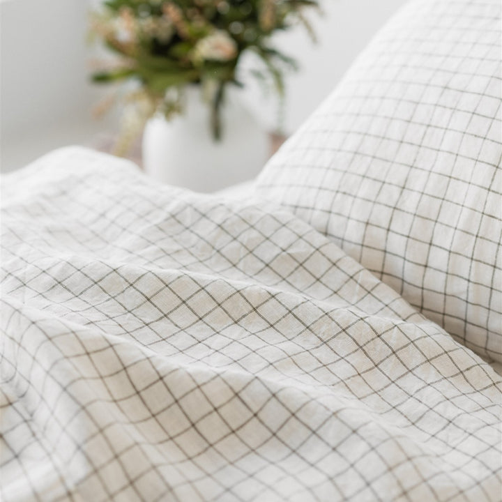 Foxtrot Home French Flax Linen styled in a bedroom with Cactus Grid Duvet, Cactus Sheets Set and Pillowcases