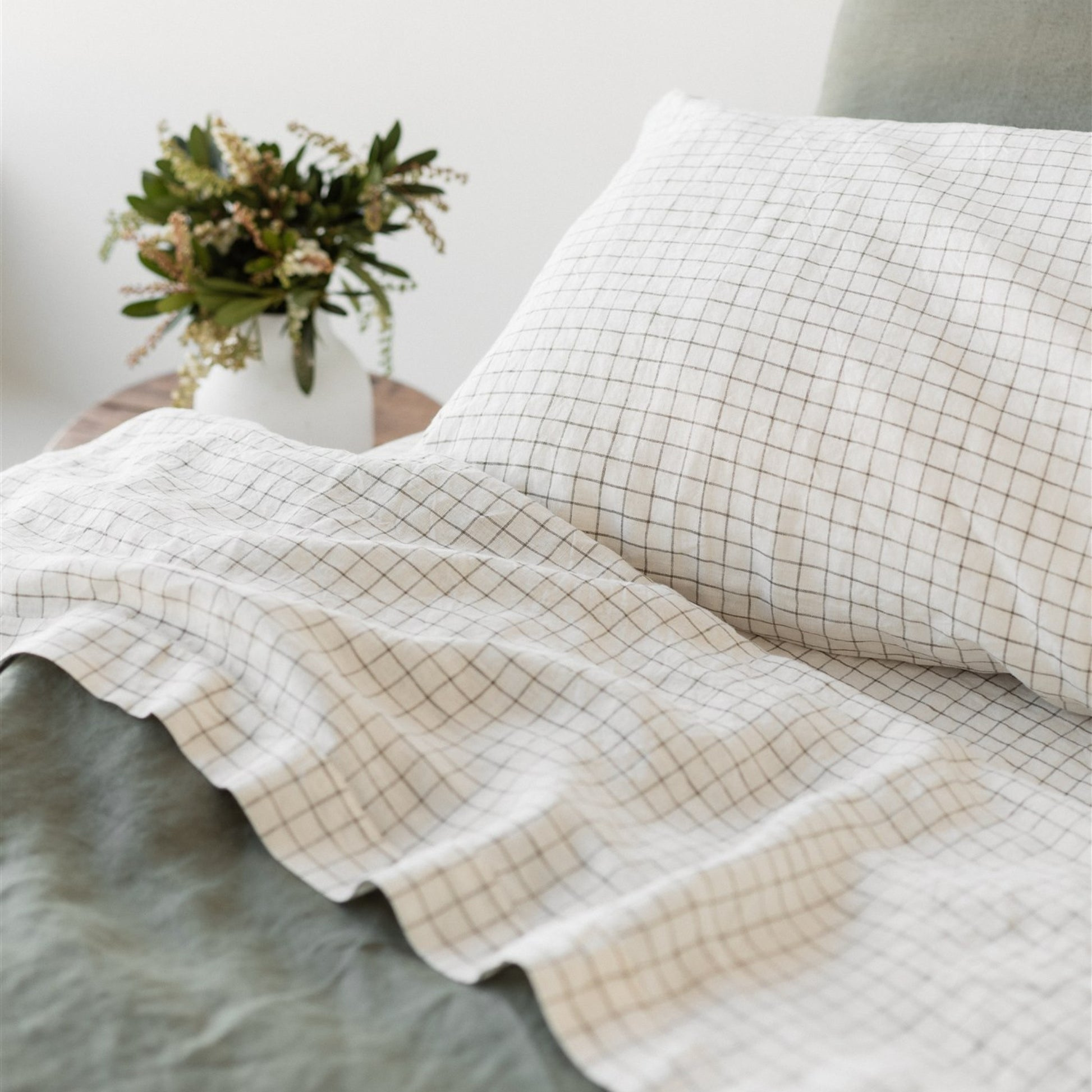 Foxtrot Home French Flax Linen styled in a bedroom with Cactus Grid Duvet, Cactus Sheets Set and Pillowcases