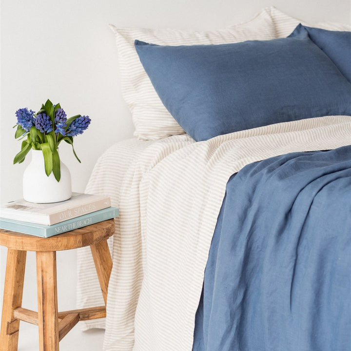 Foxtrot Home French Flax Linen styled in a bedroom with Coastal Blue Duvet