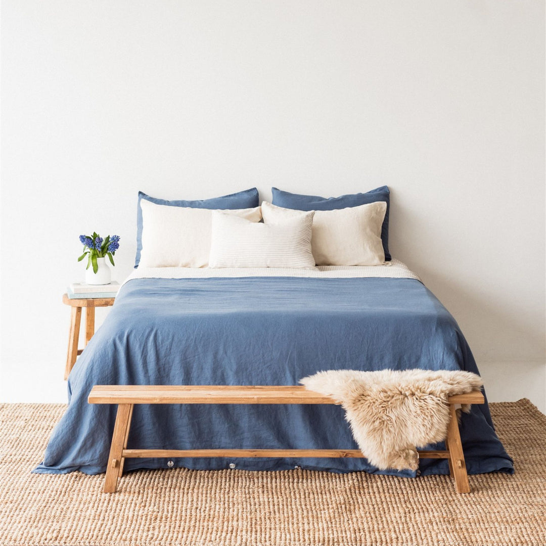 Foxtrot Home French Flax Linen styled in a bedroom with Coastal Blue Duvet