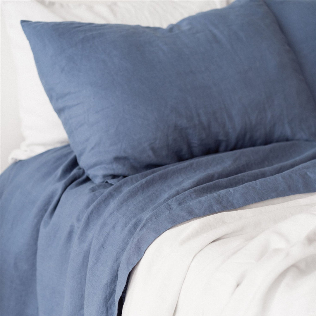 Foxtrot Home French Flax Linen styled in a bedroom with Coastal Blue Sheet Sets