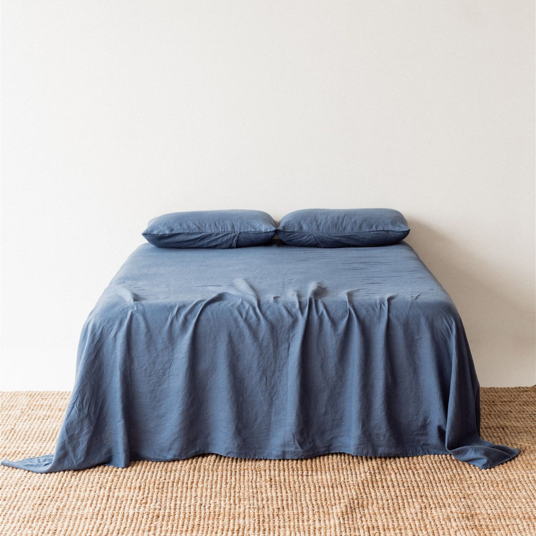 Foxtrot Home French Flax Linen styled in a bedroom with Coastal Blue Sheet Sets