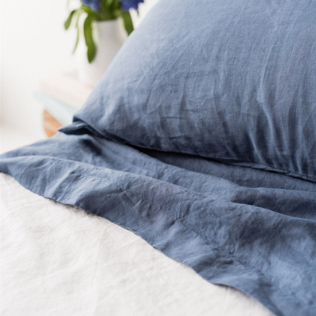 Foxtrot Home French Flax Linen styled in a bedroom with Coastal Blue Sheet Sets