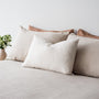 Foxtrot Home French Flax Linen styled in a bedroom with Malt Brown Grid Rectangle Cushion Cover.
