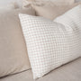 Foxtrot Home French Flax Linen styled in a bedroom with Malt Brown Grid Rectangle Cushion Cover.