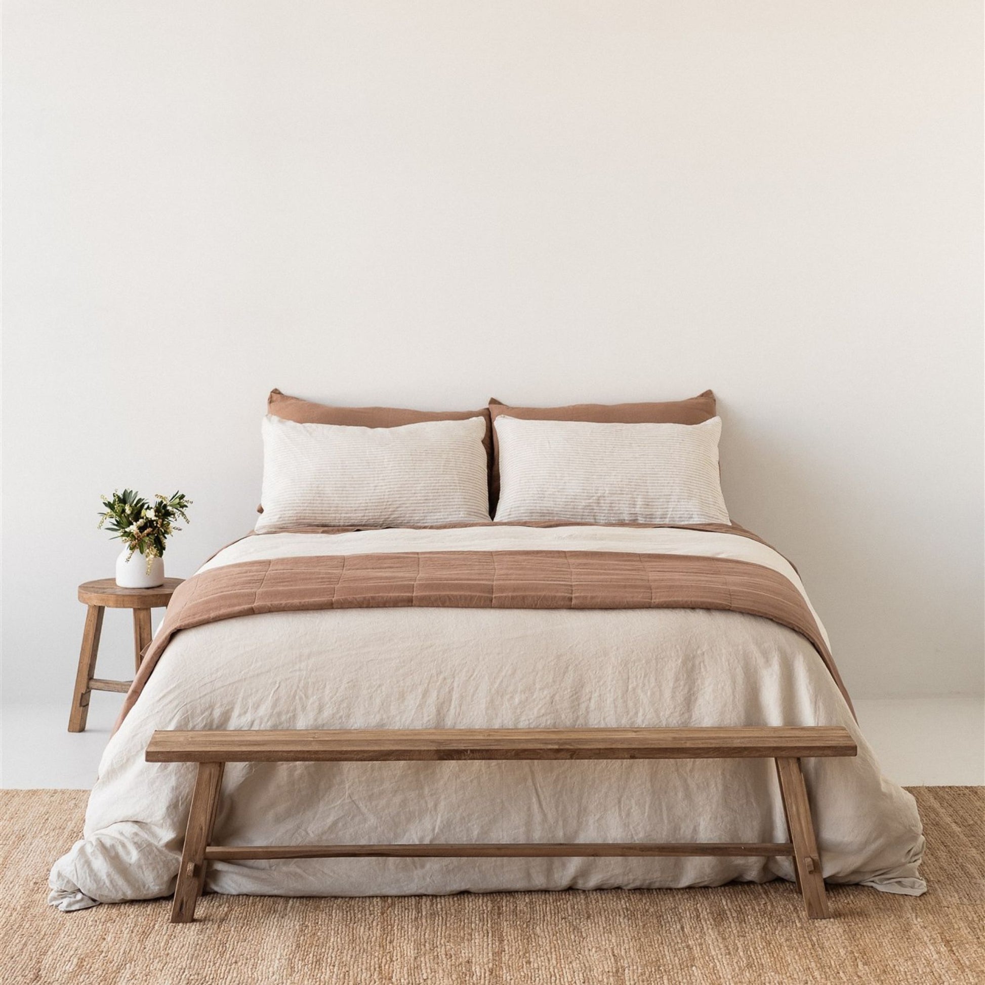 Foxtrot Home French Flax Linen styled in a bedroom with Malt Brown and Sand Stripes Quilt