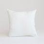 Foxtrot Home French Flax Linen styled in a bedroom with Off White Cushion Cover.