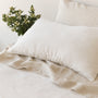 Foxtrot Home French Flax Linen styled in a bedroom with Off White Duvet.