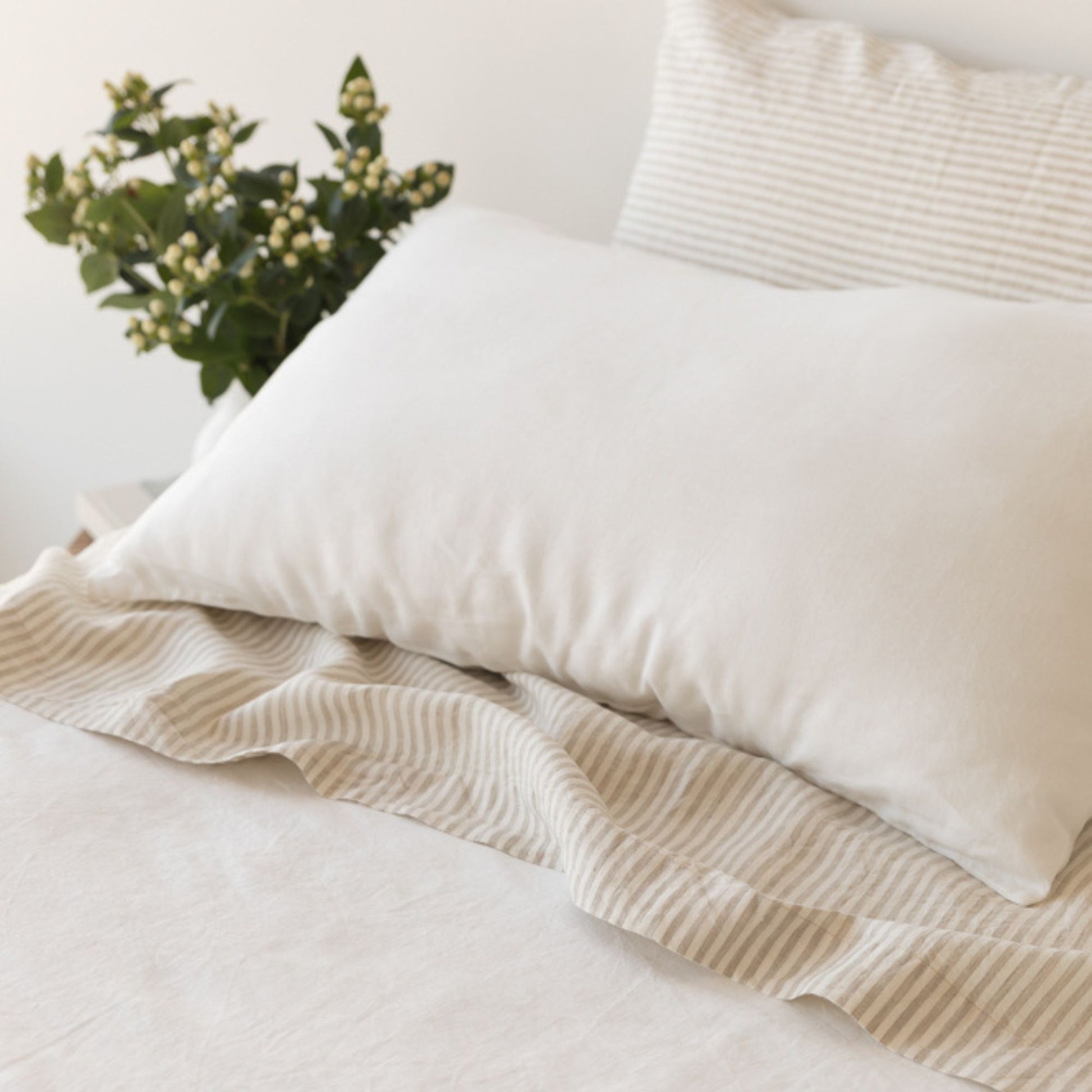 Foxtrot Home French Flax Linen styled in a bedroom with Off White Duvet.
