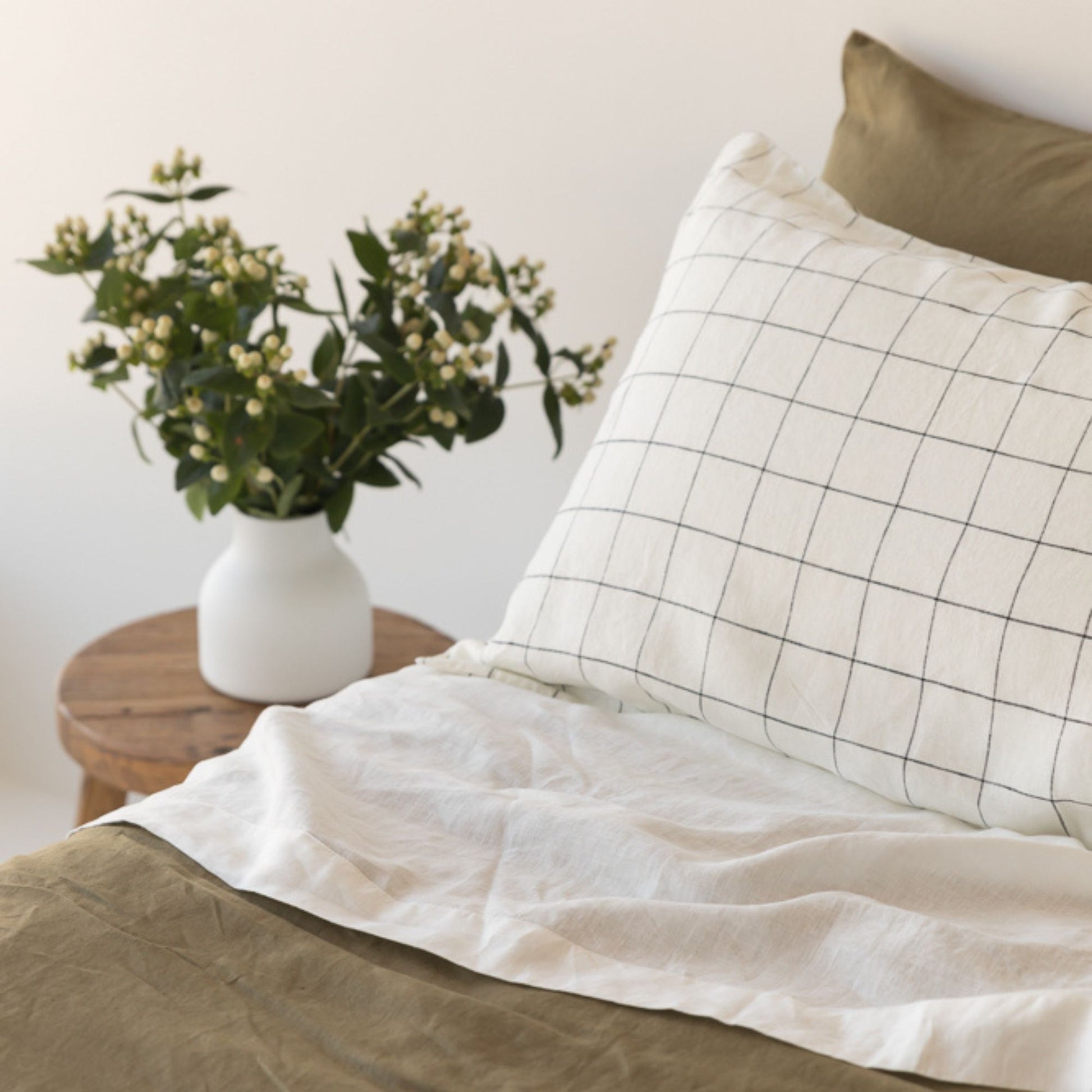 Foxtrot Home French Flax Linen styled in a bedroom with Off White Flat Sheet.