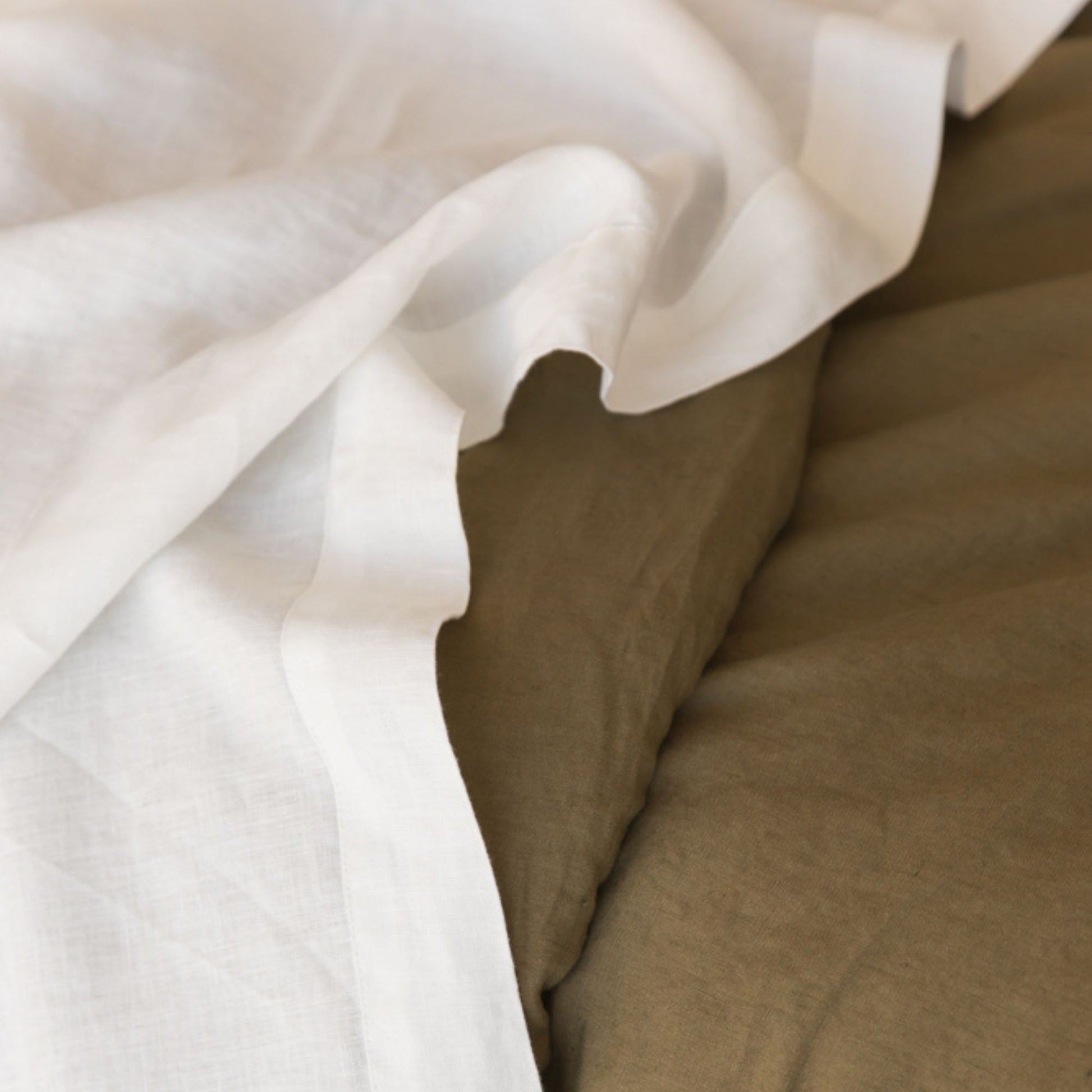 Foxtrot Home French Flax Linen styled in a bedroom with Off White Sheets Set.