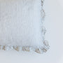 Foxtrot Home French Flax Linen styled in a bedroom with a Grey Stripes Ruffles Cushion Cover