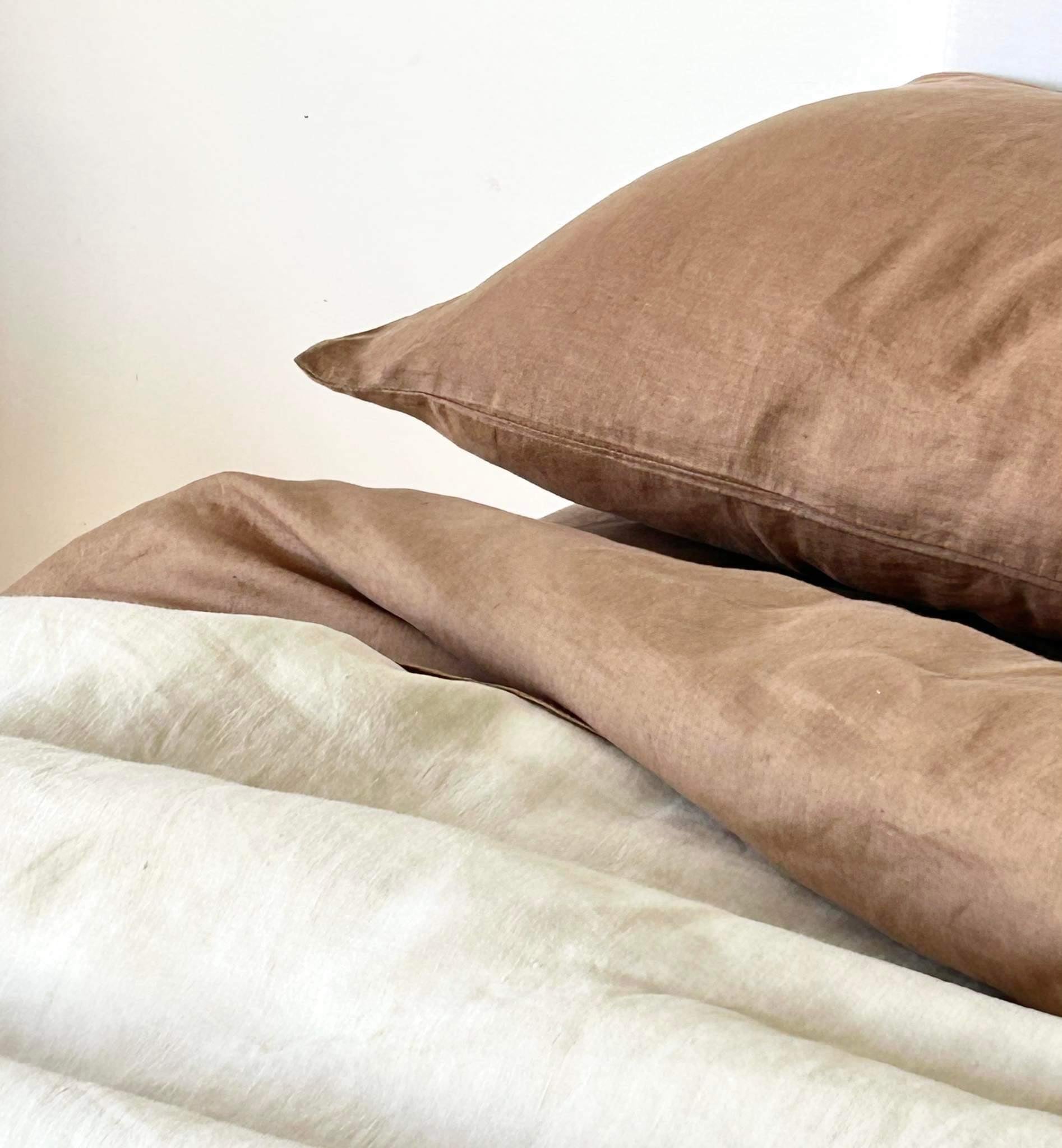 Foxtrot Home French Flax Linen styled with Malt Brown Sheets and an Oat Duvet