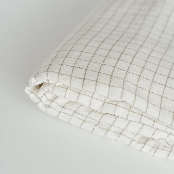 Foxtrot Home French Flax Linen styled with Malt Brown Grid Sheet Sets