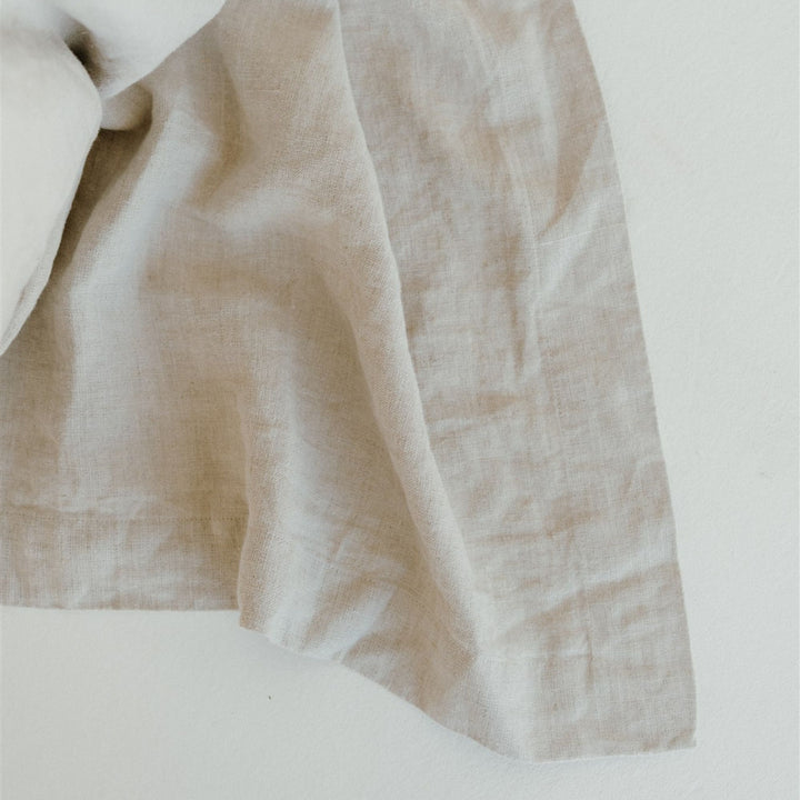 Foxtrot Home French Flax Linen styled in a bedroom with a Natural Bedspread