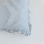 Foxtrot Home French Flax Linen styled in a bedroom with a Navy Stripes Ruffles Cushion Cover