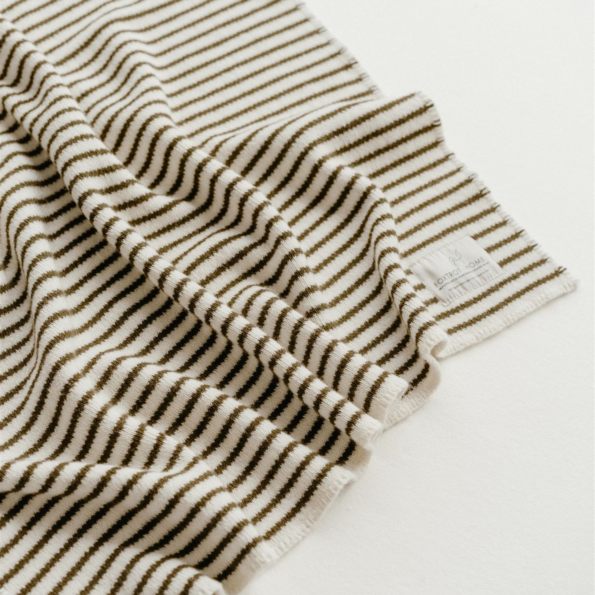 Foxtrot Home New Zealand Wool Baby Blanket in Olive Stripes