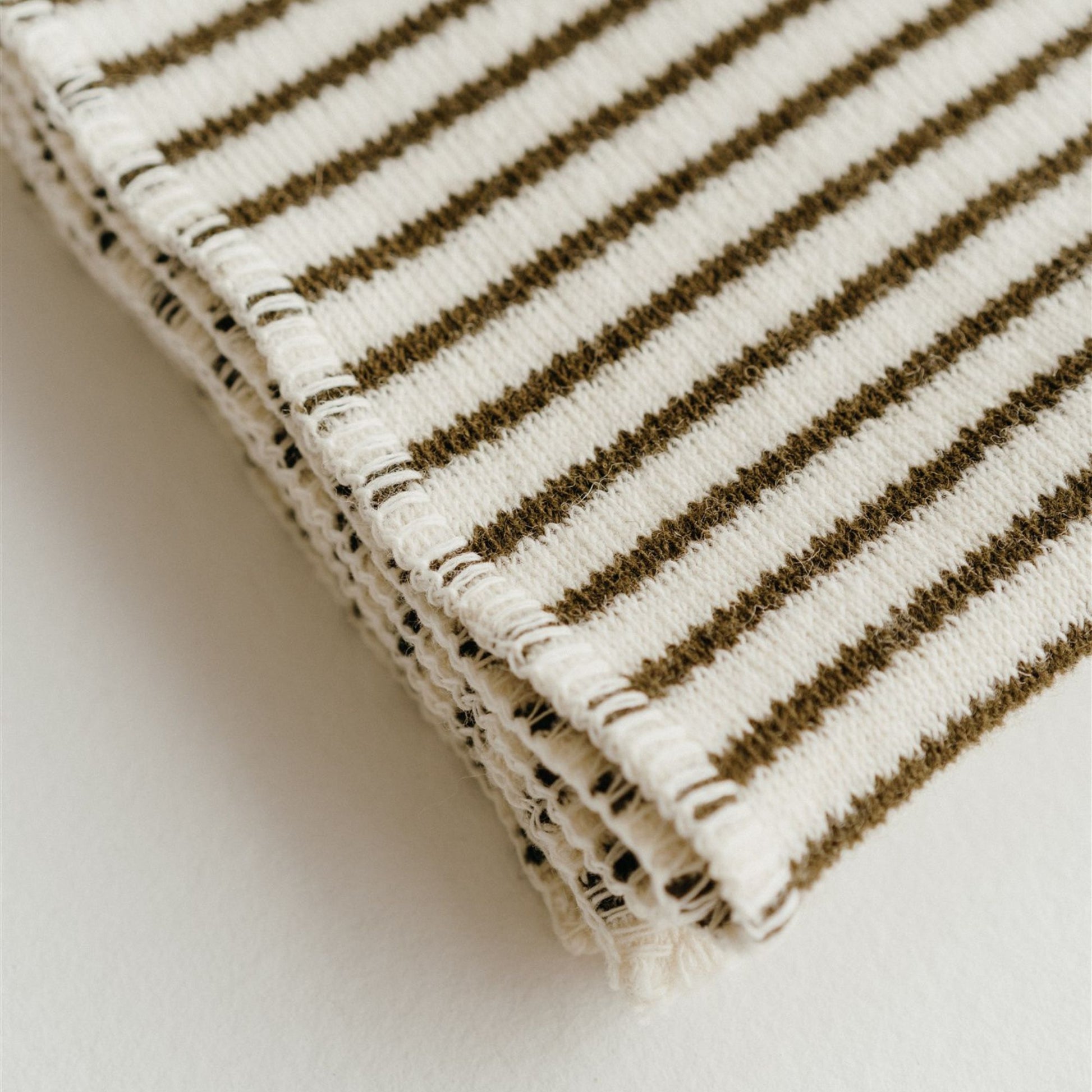 Foxtrot Home New Zealand Wool Baby Blanket in Olive Stripes