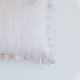 Foxtrot Home French Flax Linen styled in a bedroom with a Pink Stripes Ruffles Cushion Cover